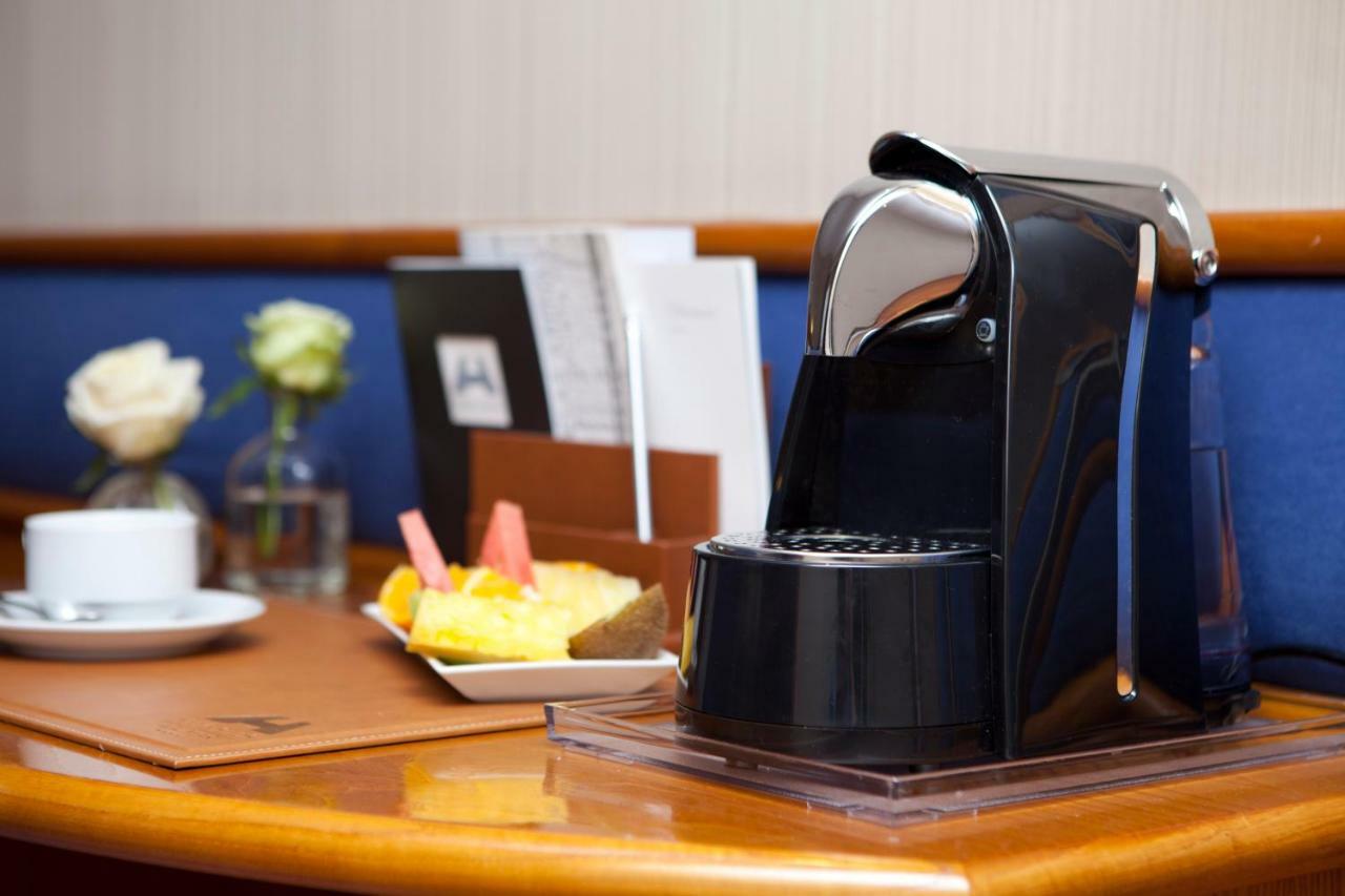 Hotel Agumar Madrid Esterno foto A Nespresso coffee machine