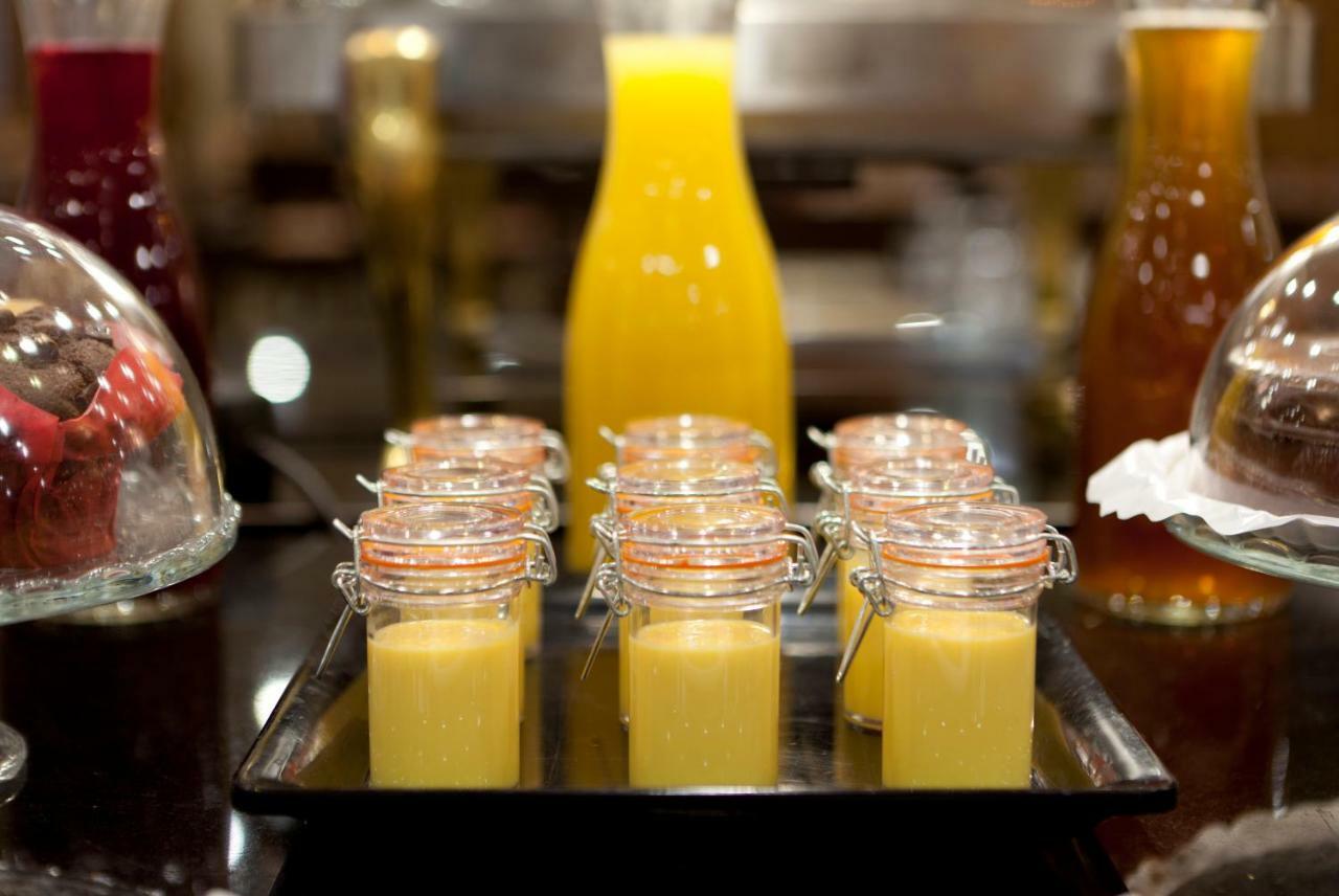 Hotel Agumar Madrid Esterno foto Orange juice